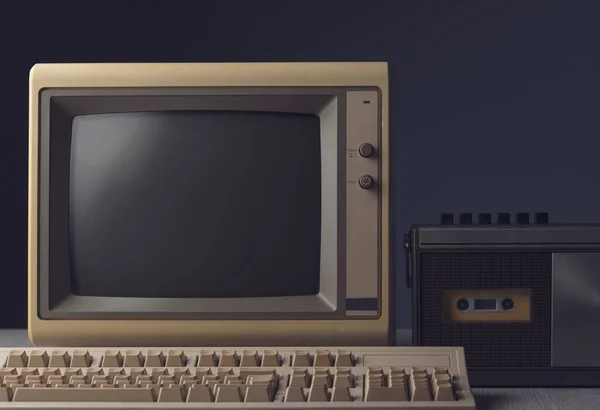 Vintage personal computer and cassette player on a desktop, outdated electronics concept