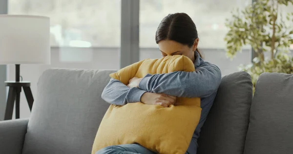 Depressed Lonely Woman Sitting Sofa Home Hugging Cushion — 스톡 사진