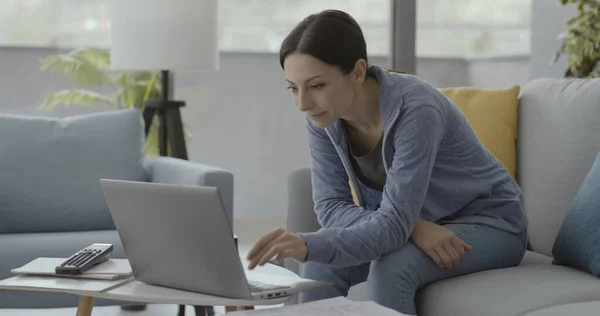 Woman Sitting Couch Home Connecting Online Her Laptop Remote Work — 스톡 사진