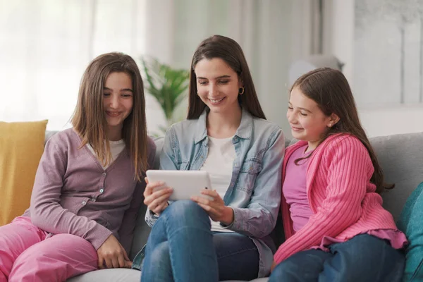 Happy Mother Kids Sitting Couch Connecting Digital Tablet Watching Videos — Zdjęcie stockowe