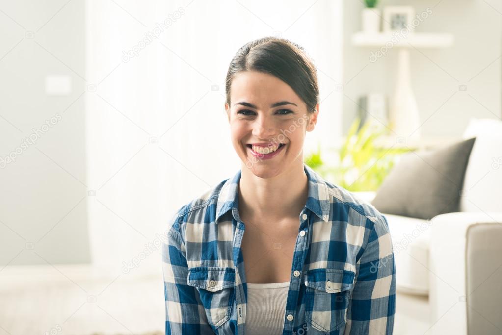 Woman smiling in the living room