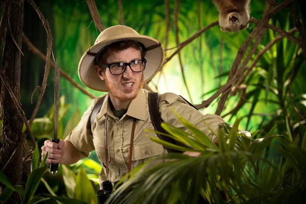 Aggressive adventurer exploring jungle — Stock Photo, Image