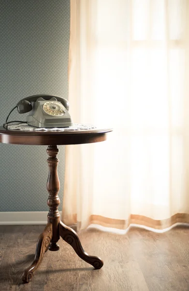 Vintage telephone in the living room — Stock Photo, Image