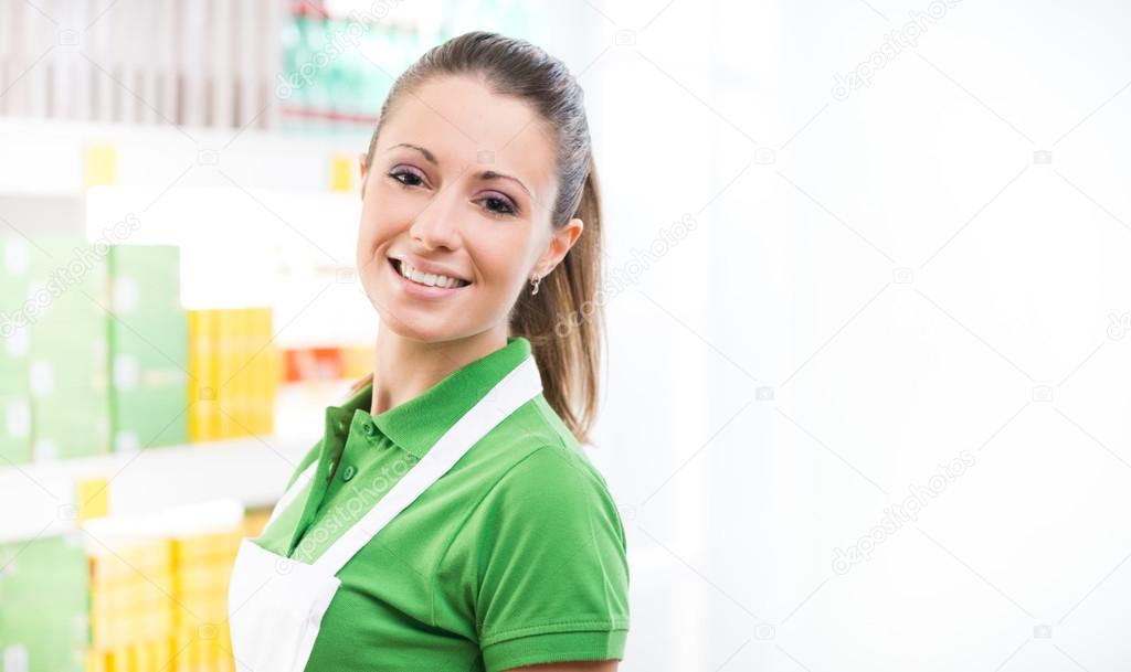 Female sales clerk working at supermarket