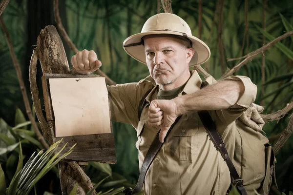 Displeased explorer with thumbs down — Stock Photo, Image