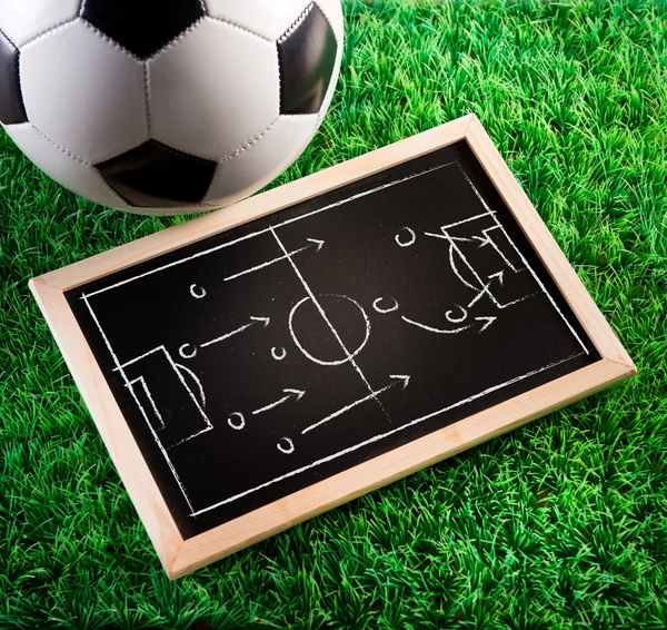 Blackboard with soccer ball — Stock Photo, Image