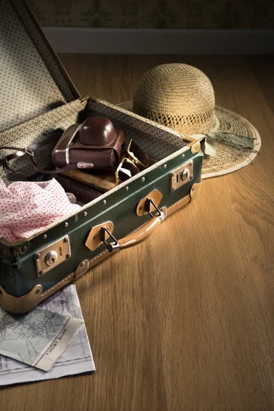 Vintage luggage with sunglasses