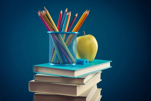 Books, apple and color pencils — Stock Photo, Image