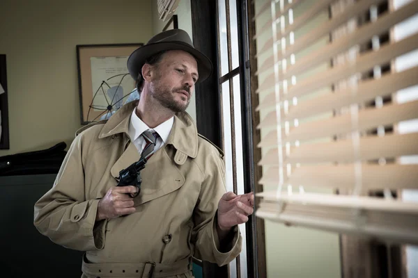 Spy agent peeking from a window — Stock Photo, Image