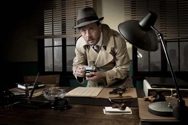 Spy agent photographing documents — Stock Photo, Image