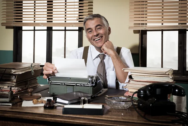 Reporter working at office desk — Stock Photo, Image