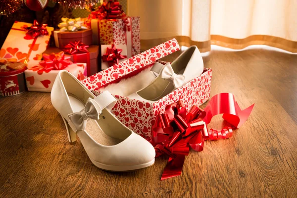 Female elegant shoes in a gift box — Stock Photo, Image