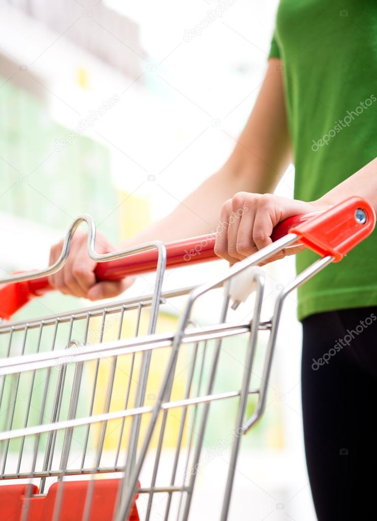 Woman shopping at supermarket