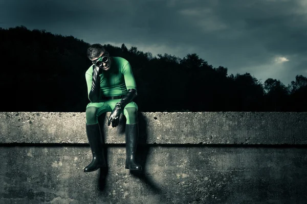 Pensive green superhero — Stock Photo, Image