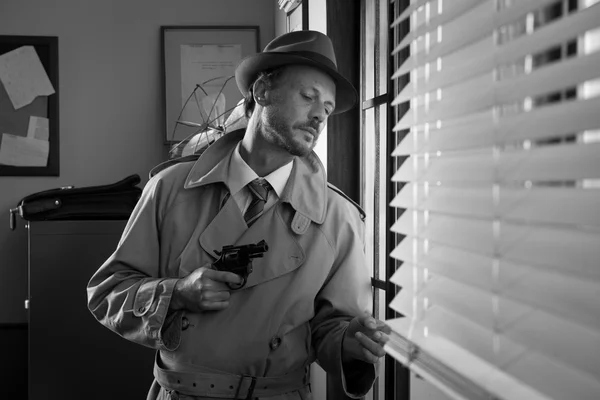 Spy agent peeking from a window — Stock Photo, Image