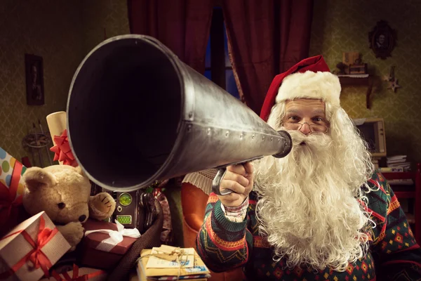 Santa Claus shouting into megaphone — Stock Photo, Image