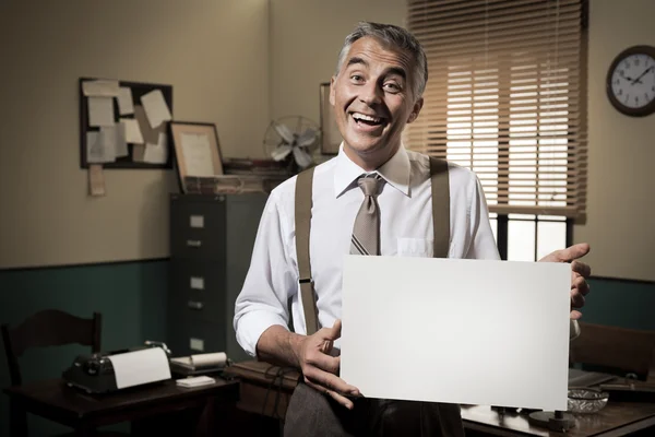 Businessman showing blank poster — Stock Photo, Image