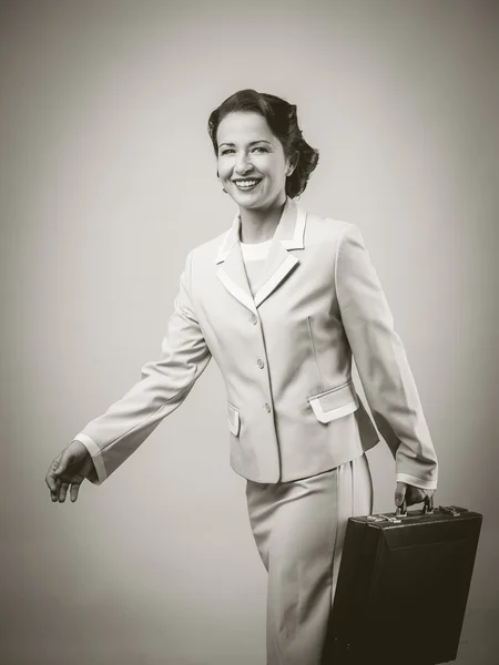 Vintage woman with suitcases — Stock Photo, Image