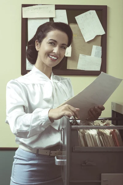 Secretary searching files — Stock Photo, Image