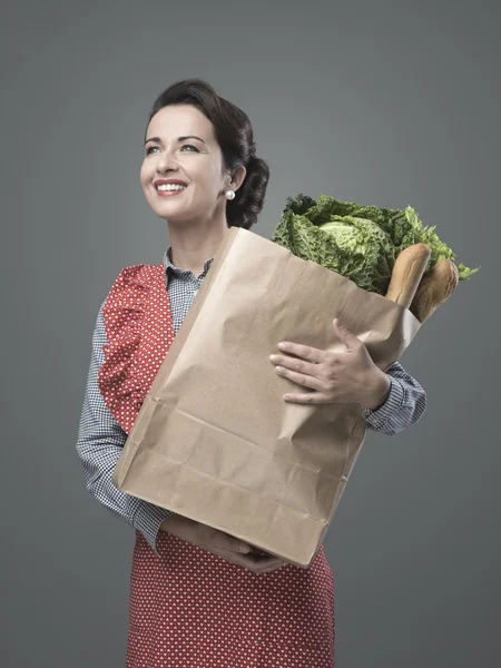 Woman holding shopping grocery bag — Stock Photo, Image