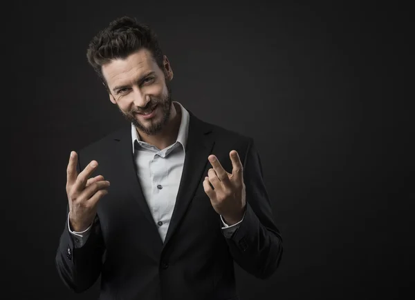 Confident businessman gesturing — Stock Photo, Image