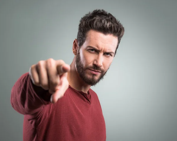 Angry man pointing at camera — Stock Photo, Image