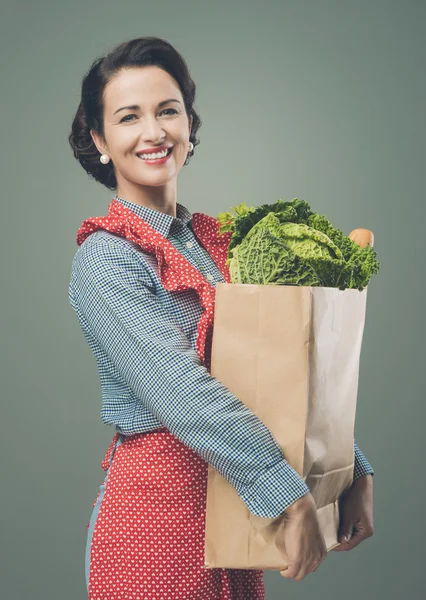 Woman holding shopping grocery bag — Stock Photo, Image