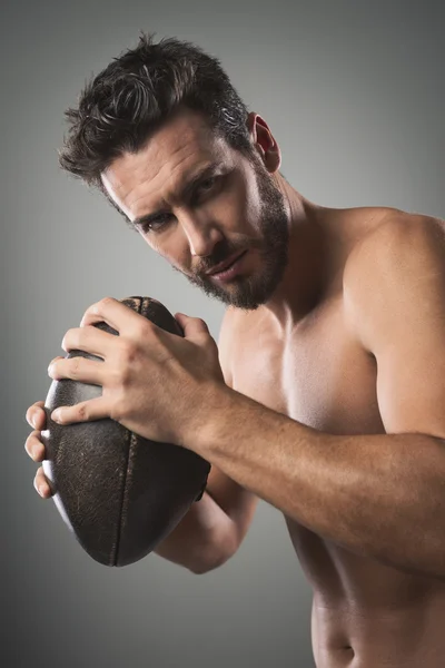 Spelare hålla bollen — Stockfoto