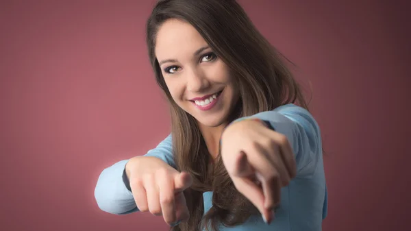 Young girl pointing at camera — Stock Photo, Image