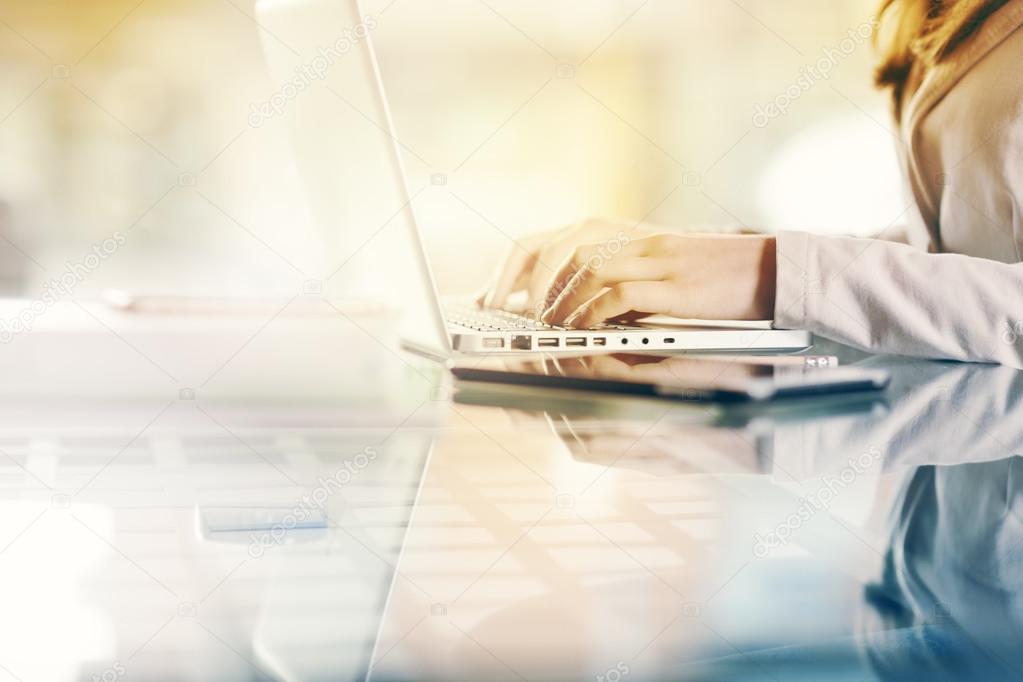 Business woman at work with laptop