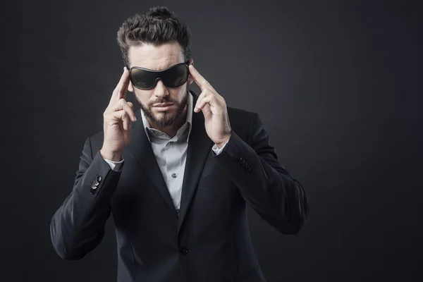 Man adjusting sunglasses — Stock Photo, Image