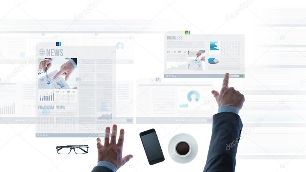 businessman pointing at financial reports