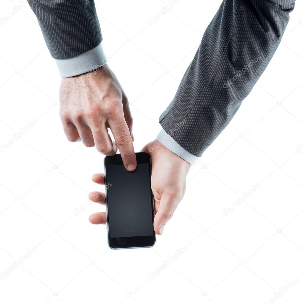 Businessman holding a smart phone