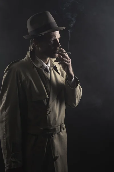 Agent smoking a cigarette — Stok fotoğraf