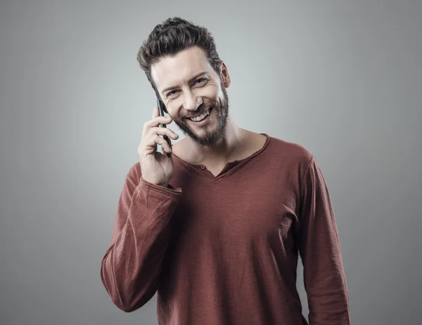 Young man having a phone call — Stock Photo, Image