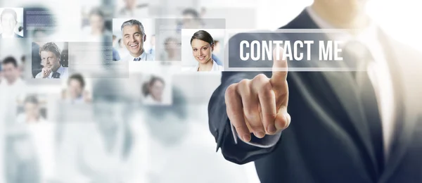 Businessman pressing a ghost button on a touch screen device — Stock Photo, Image