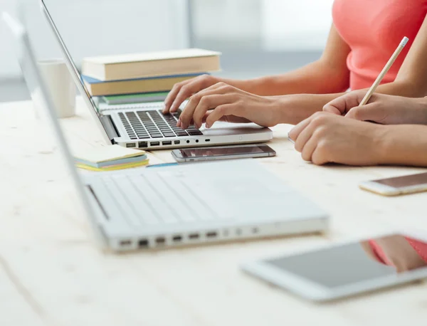 Girls studying at desk — Stock Photo, Image