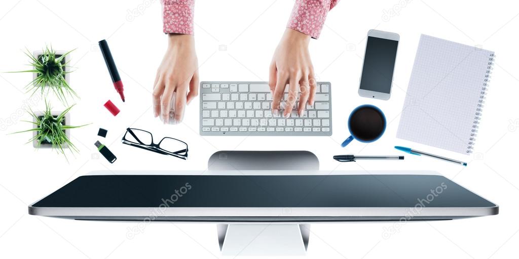 woman working at computer on a desktop