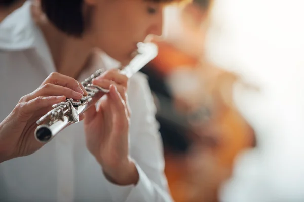 Professional flute player performing — Stock Photo, Image