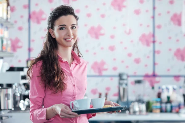 Waitress serving coffee — Stock Photo, Image