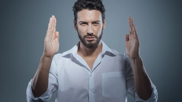 Young man with raised hands — Stock Photo, Image