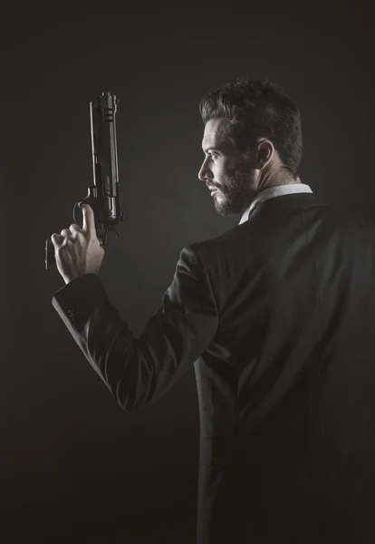 Muž s nebezpečnou zbraní — Stock fotografie