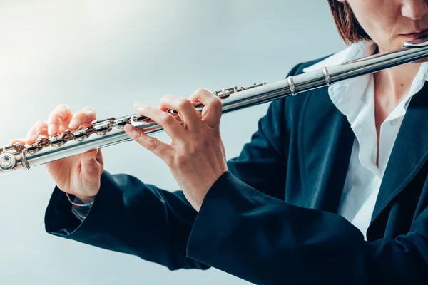 Female flutist performing — Stock Photo, Image