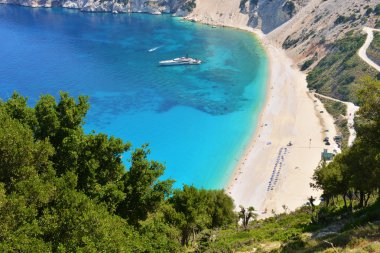 Famous beach Mirtos in Greece clipart