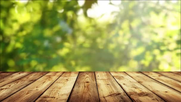 Empty Wooden Table Fresh Green Defocused Background — Αρχείο Βίντεο