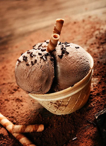 Chocolate ice cream with sweet tubes — Stock Photo, Image