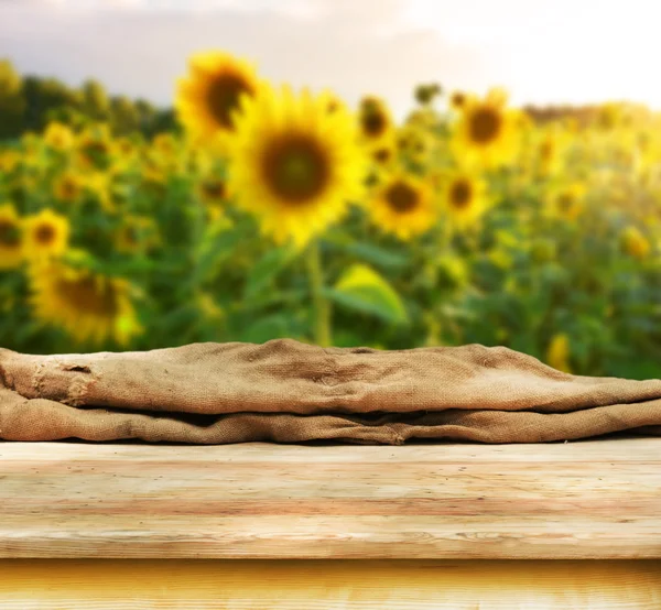 Empty table with sunflowers — Stock Photo, Image