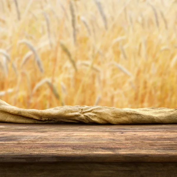 Empty table on wheat field — Stock Photo, Image