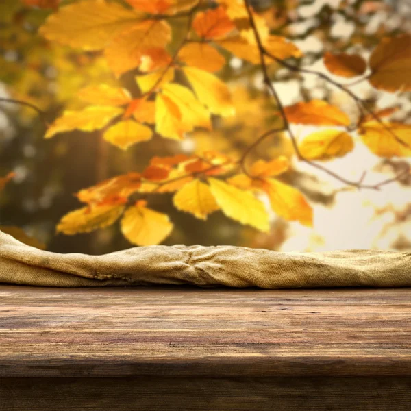 Table with autumn background — Stock Photo © kwasny222 #32506983