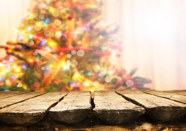 Empty table  with blurred Christmas tree — Stock Photo, Image